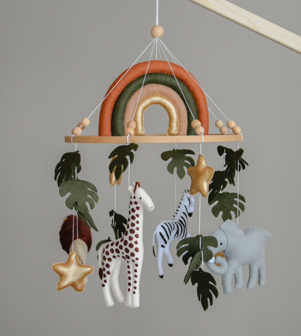 Safari Baby mobile with Lion, golden stars clouds, monstera leaves and rainbow