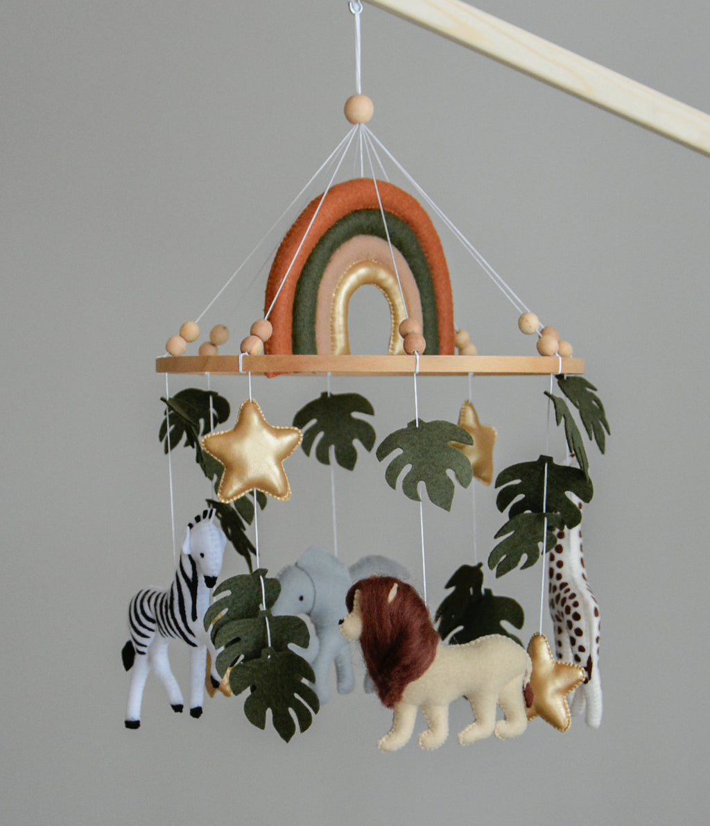 Safari Baby mobile with Lion, golden stars clouds, monstera leaves and rainbow