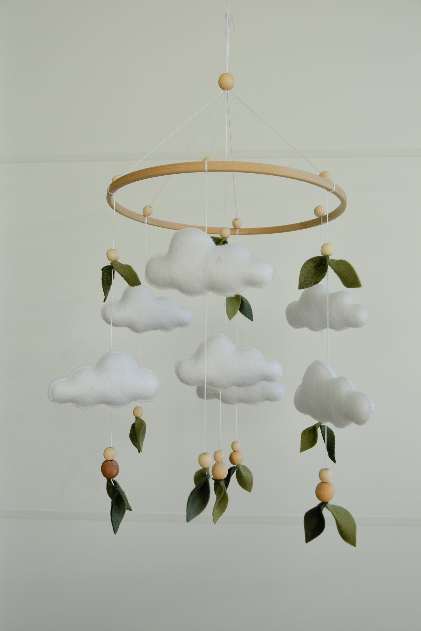 Floral mobile with leaves wooden beads and clouds