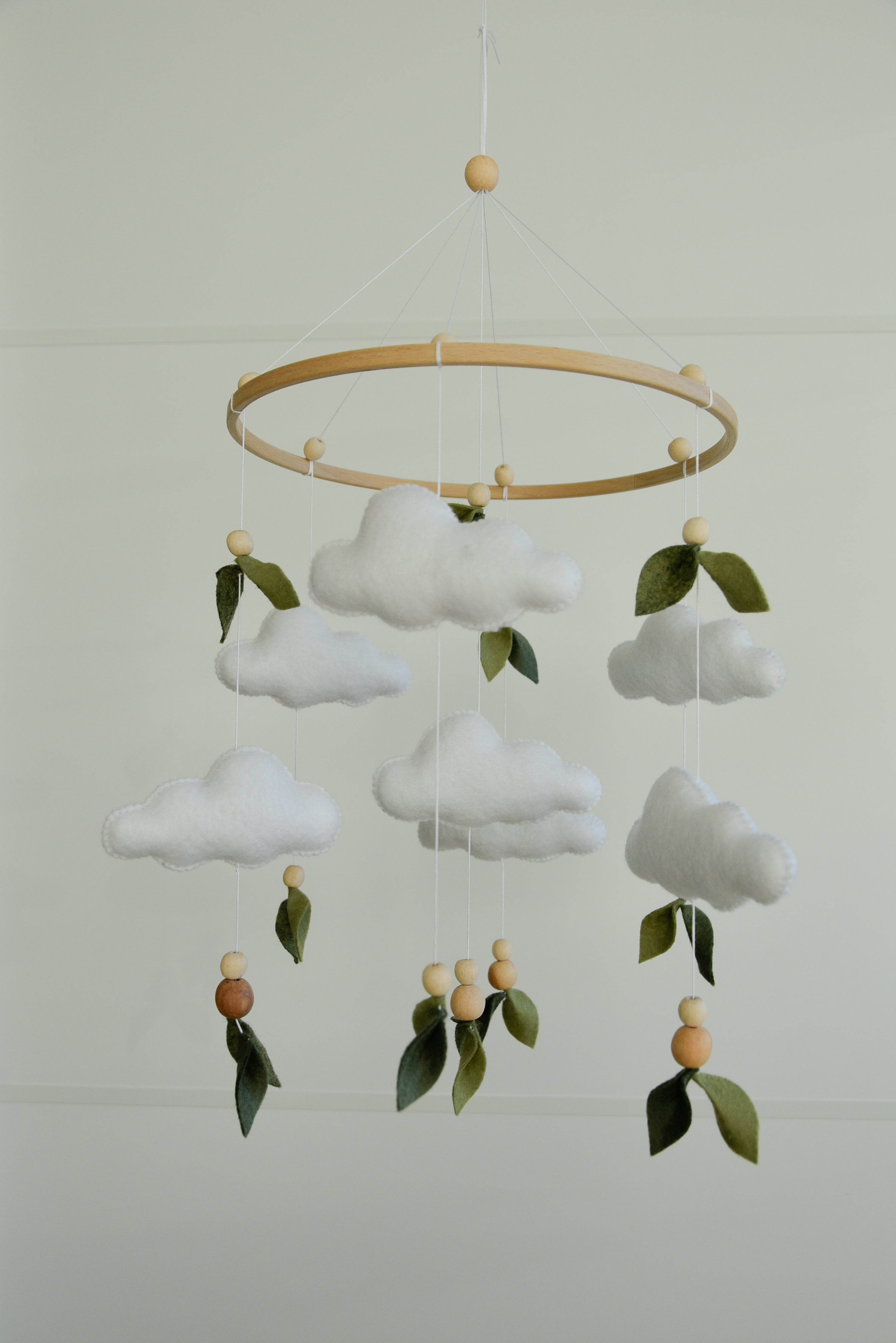 Floral mobile with leaves wooden beads and clouds - Minidreams Decor