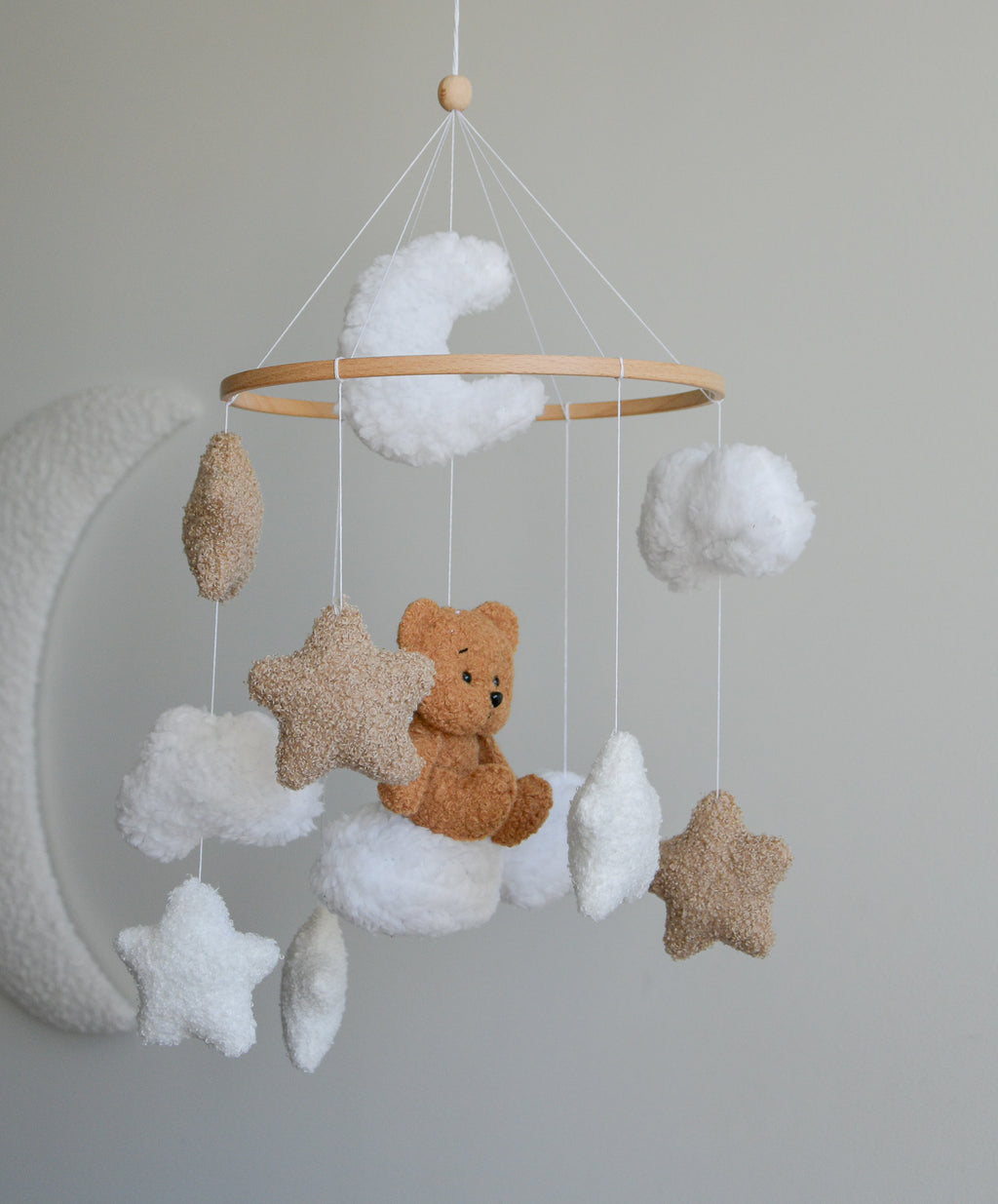 Teddy bear sitting on the cloud baby mobile