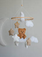 Teddy bear sitting on the cloud baby mobile