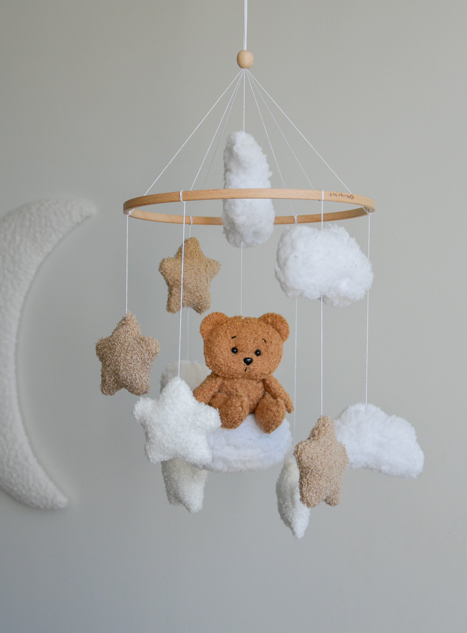 Teddy bear sitting on the cloud baby mobile