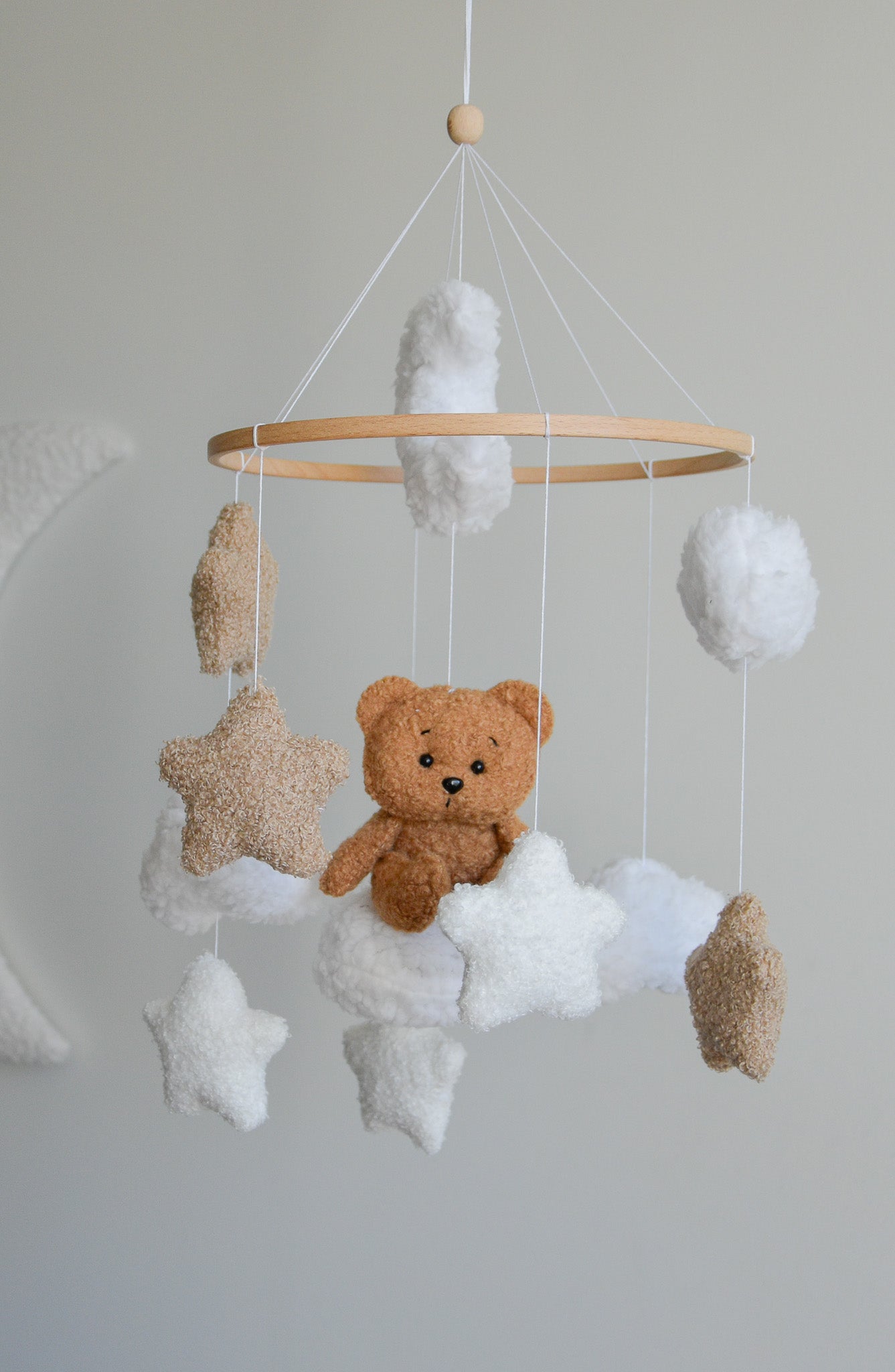 Teddy bear sitting on the cloud baby mobile