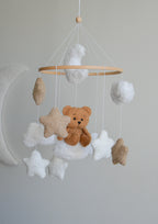 Teddy bear sitting on the cloud baby mobile