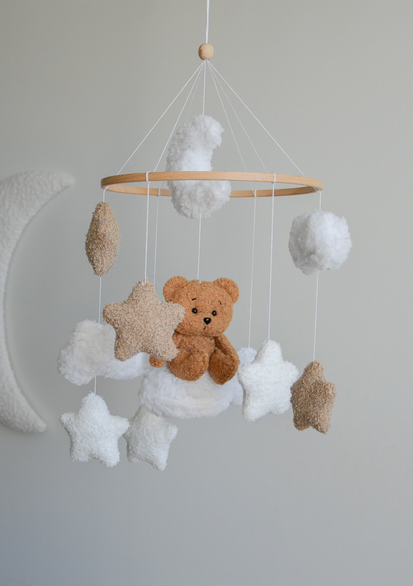 Teddy bear sitting on the cloud baby mobile