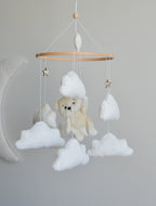 Teddy Bear hanging from balloon baby mobile with Boucle clouds