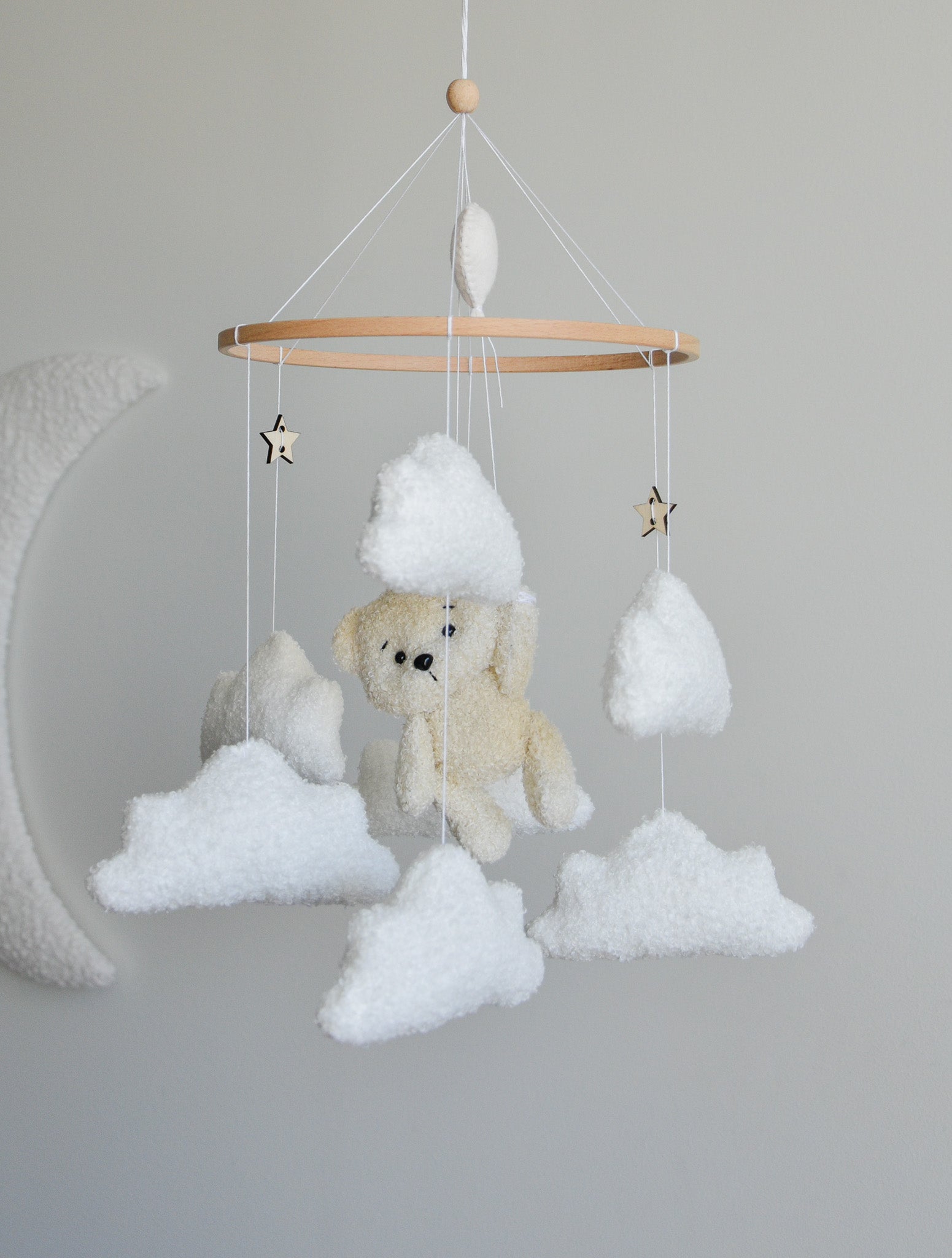 Teddy Bear hanging from balloon baby mobile with Boucle clouds