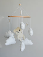 Teddy Bear hanging from balloon baby mobile with Boucle clouds
