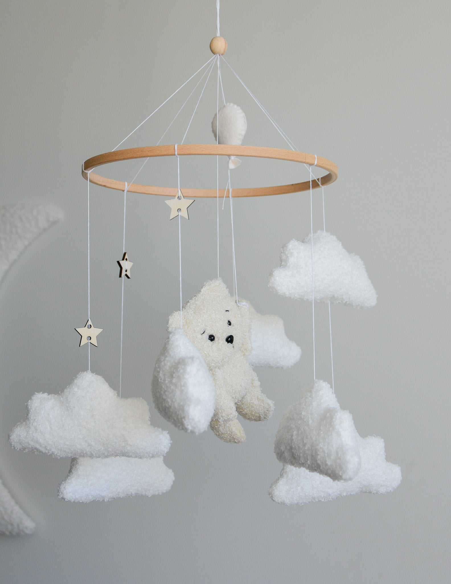Teddy Bear hanging from balloon baby mobile with Boucle clouds