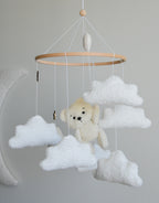 Teddy Bear hanging from balloon baby mobile with Boucle clouds