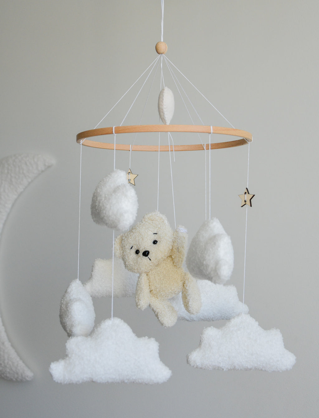 Teddy Bear hanging from balloon baby mobile with Boucle clouds