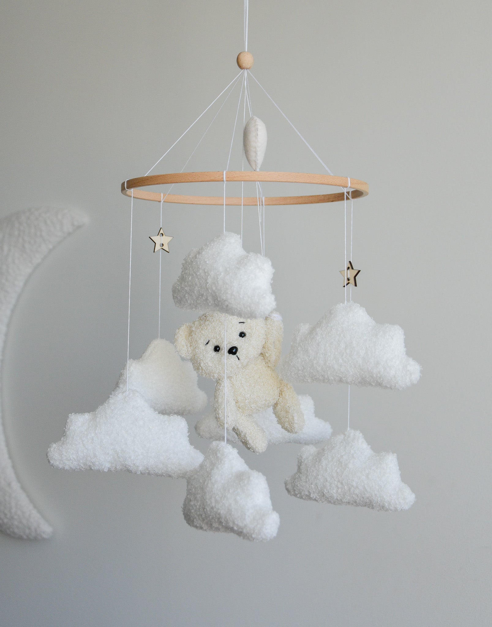 Teddy Bear hanging from balloon baby mobile with Boucle clouds
