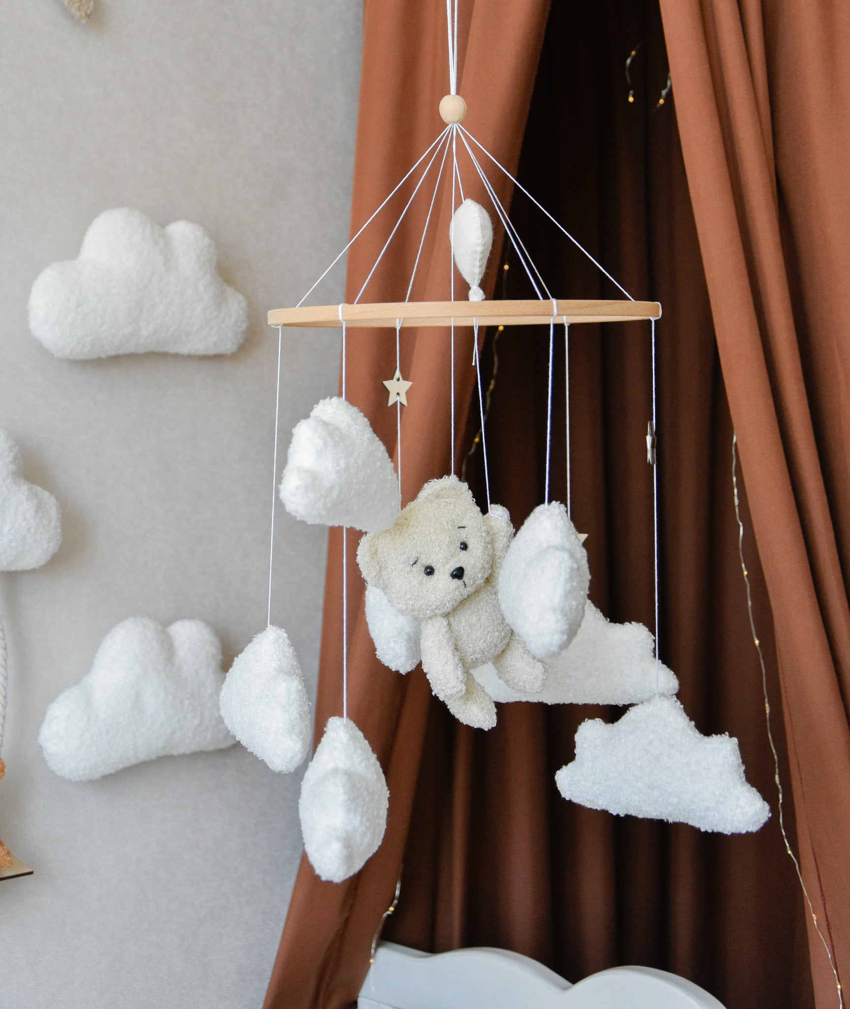 Teddy Bear hanging from balloon baby mobile with Boucle clouds