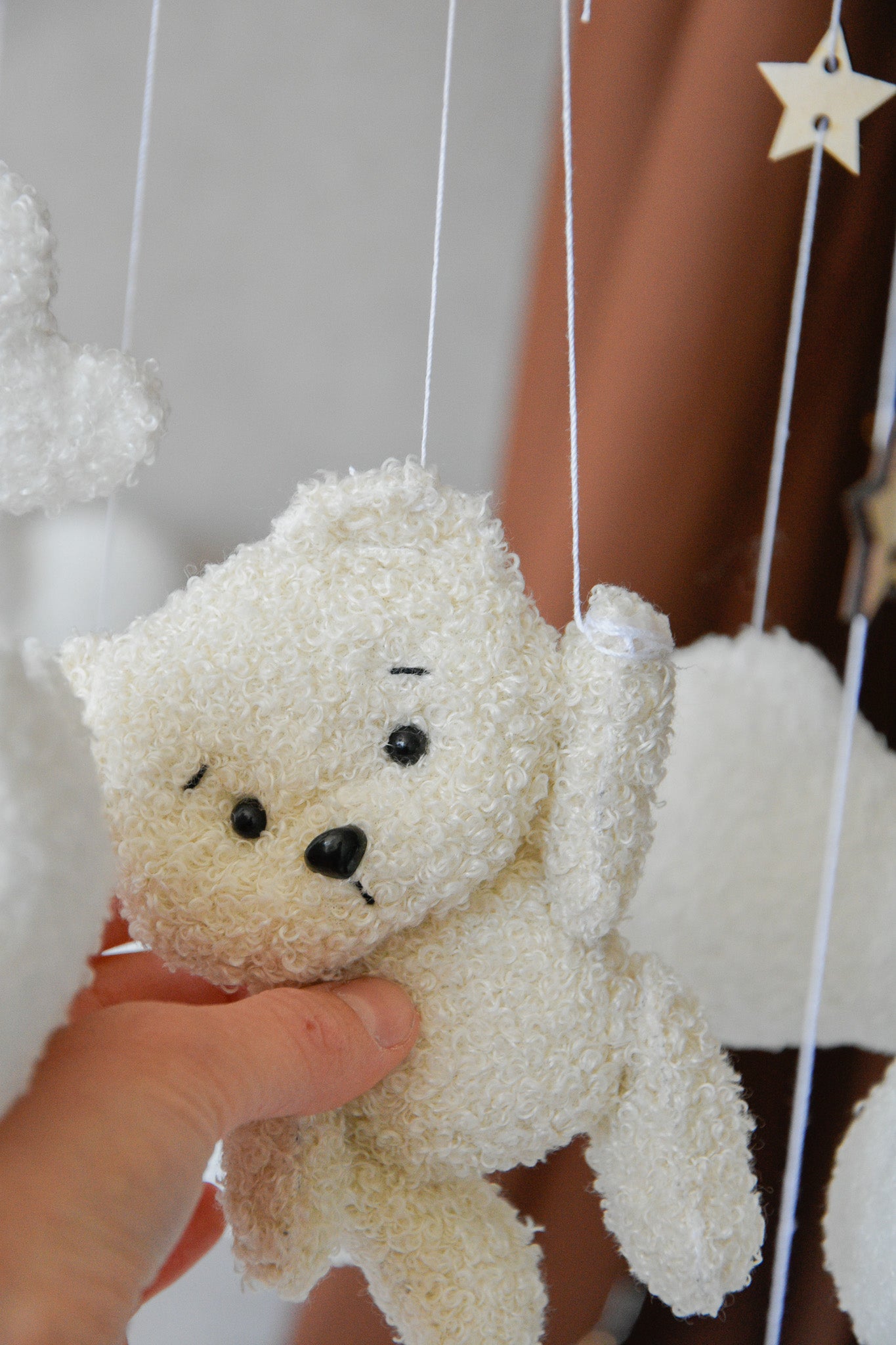 Teddy Bear hanging from balloon baby mobile with Boucle clouds