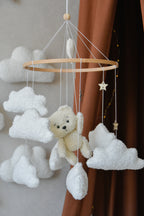 Teddy Bear hanging from balloon baby mobile with Boucle clouds