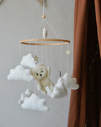 Teddy Bear hanging from balloon baby mobile with Boucle clouds