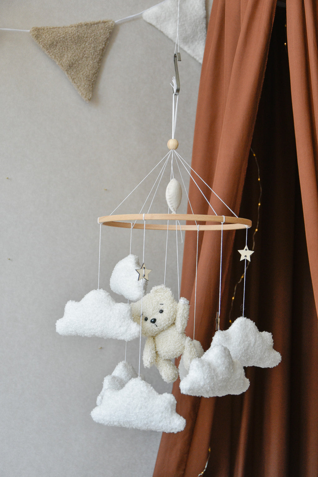 Teddy Bear hanging from balloon baby mobile with Boucle clouds