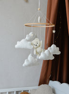 Teddy Bear hanging from balloon baby mobile with Boucle clouds