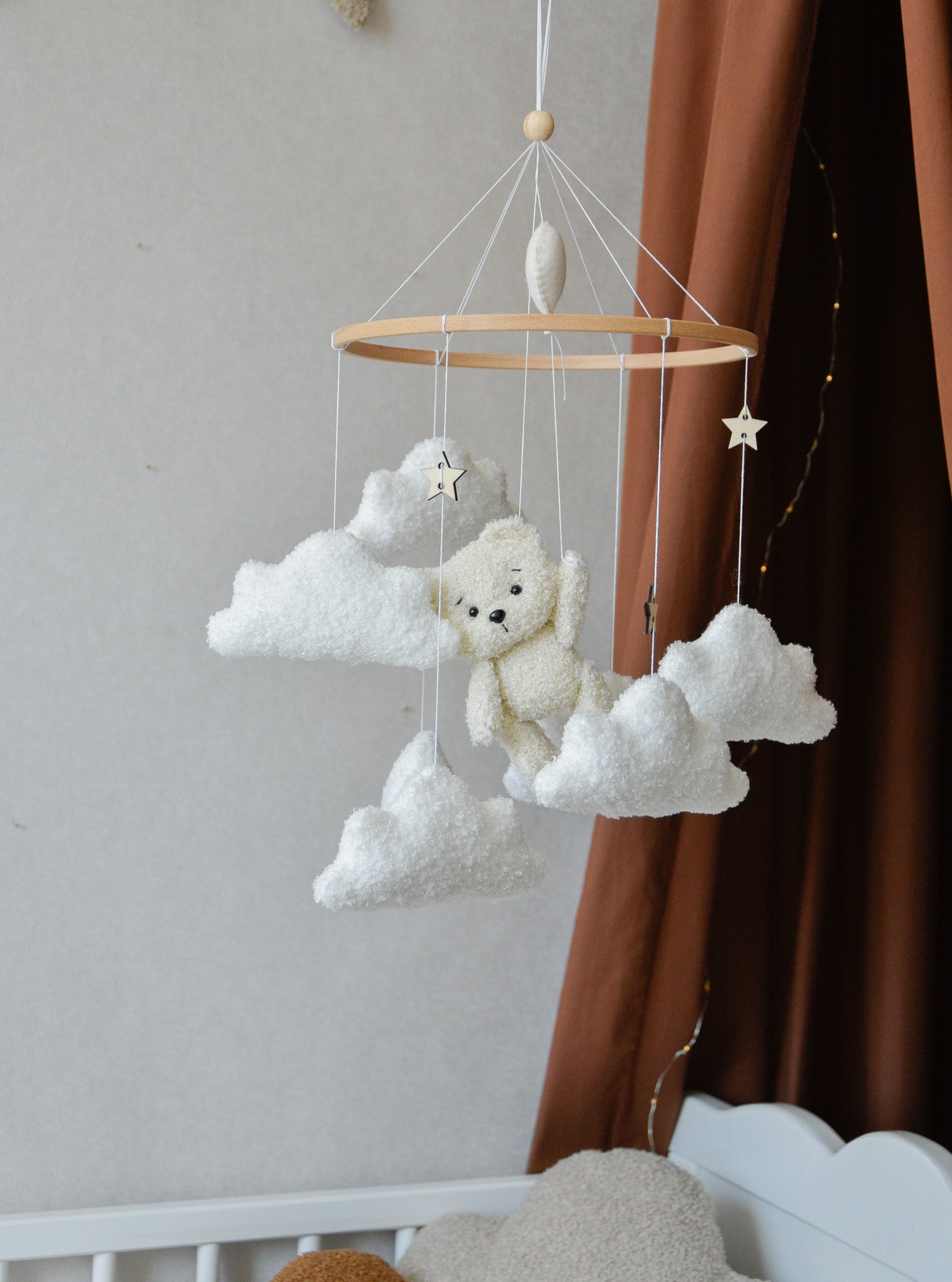 Teddy Bear hanging from balloon baby mobile with Boucle clouds