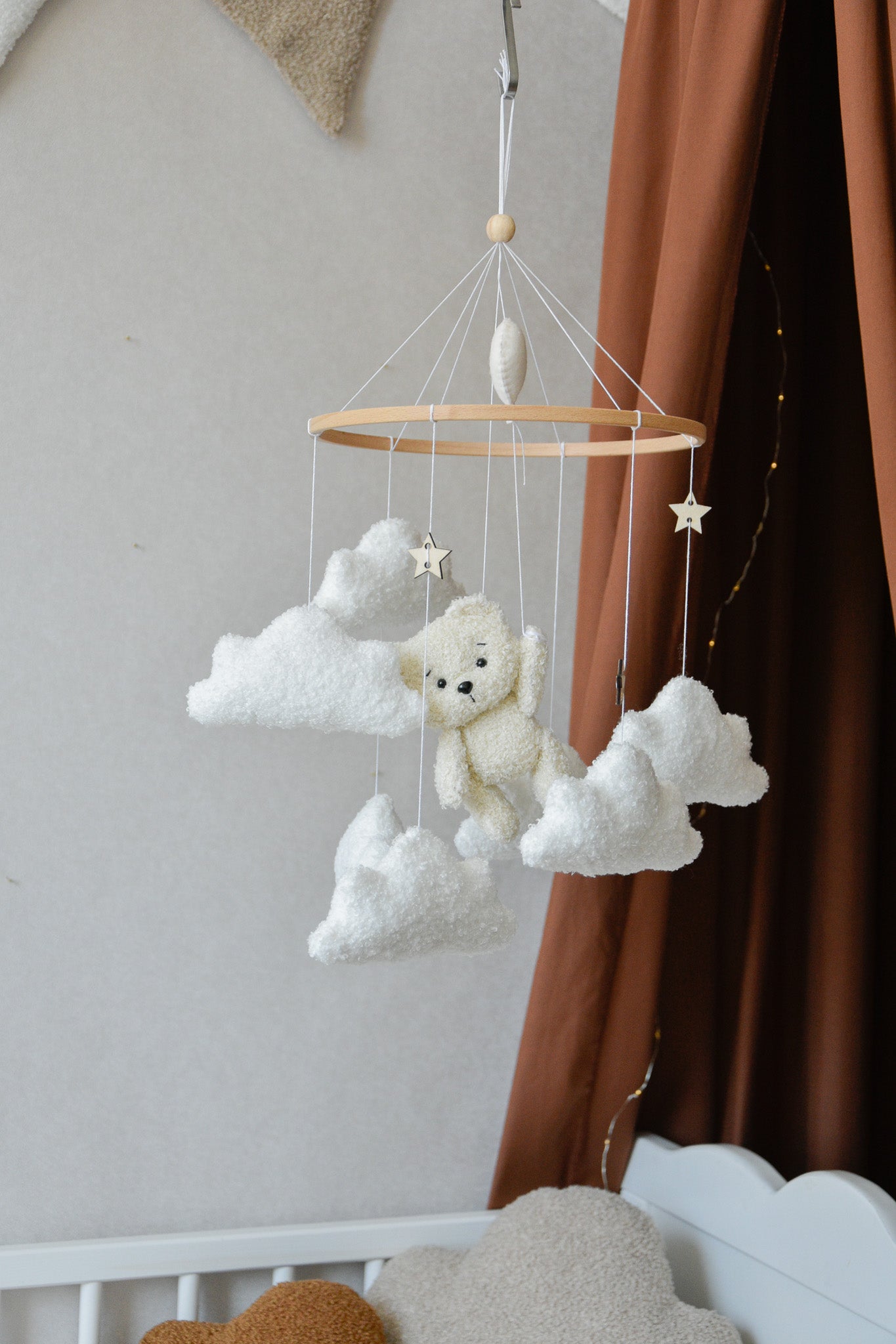 Teddy Bear hanging from balloon baby mobile with Boucle clouds