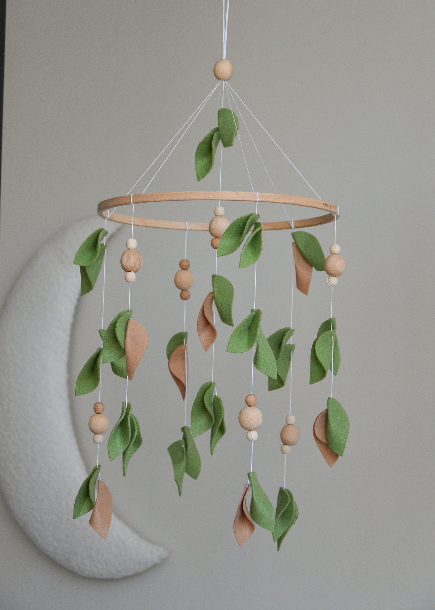 Forest style floral mobile with leaves and wooden pearls