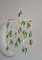 Forest style floral mobile with leaves and wooden pearls - Minidreams Decor