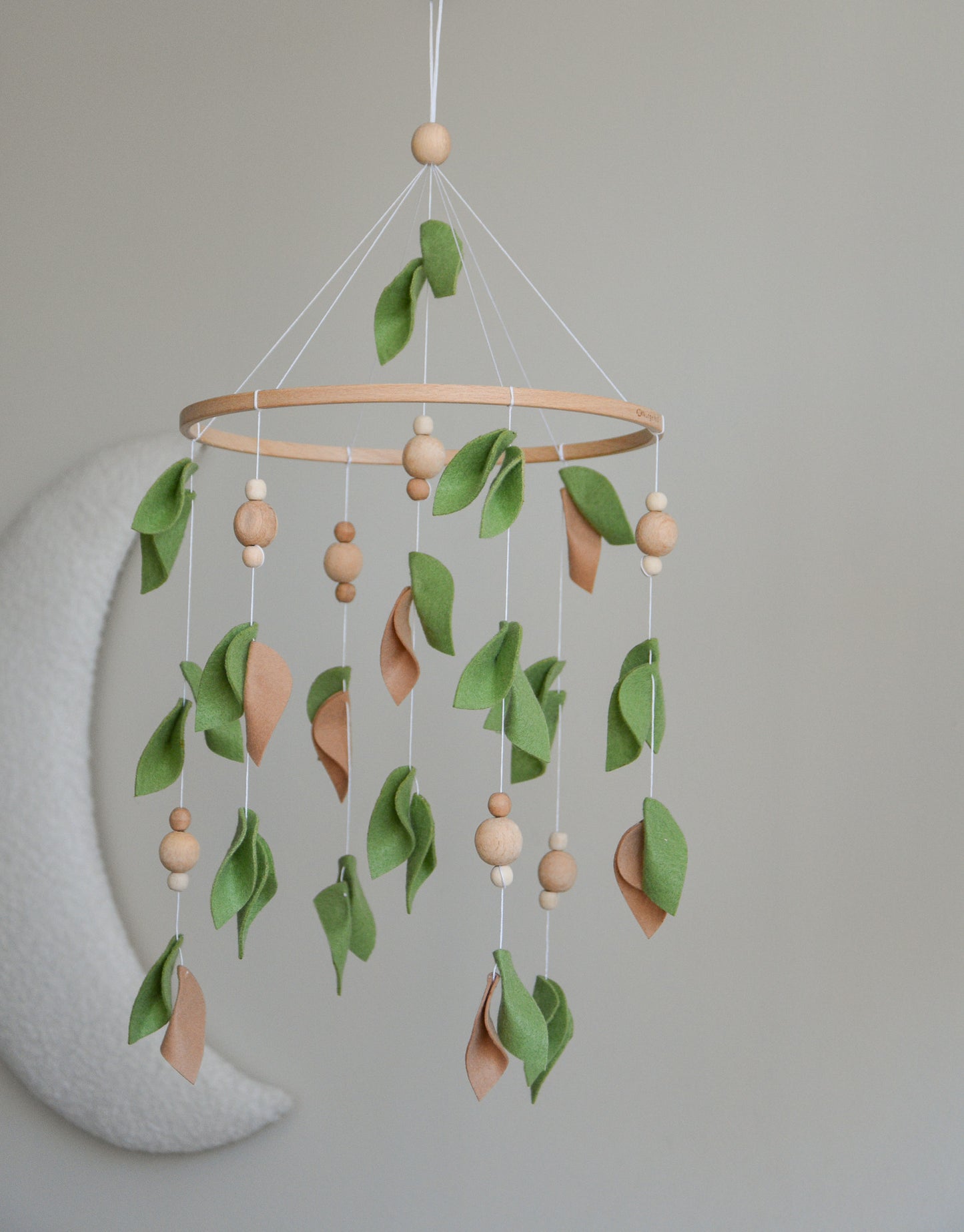 Forest style floral mobile with leaves and wooden pearls