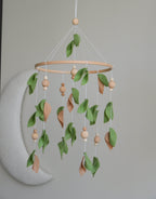 Forest style floral mobile with leaves and wooden pearls - Minidreams Decor