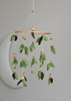 Forest style floral mobile with leaves and wooden pearls - Minidreams Decor