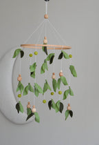 Forest style floral mobile with leaves and wooden pearls - Minidreams Decor