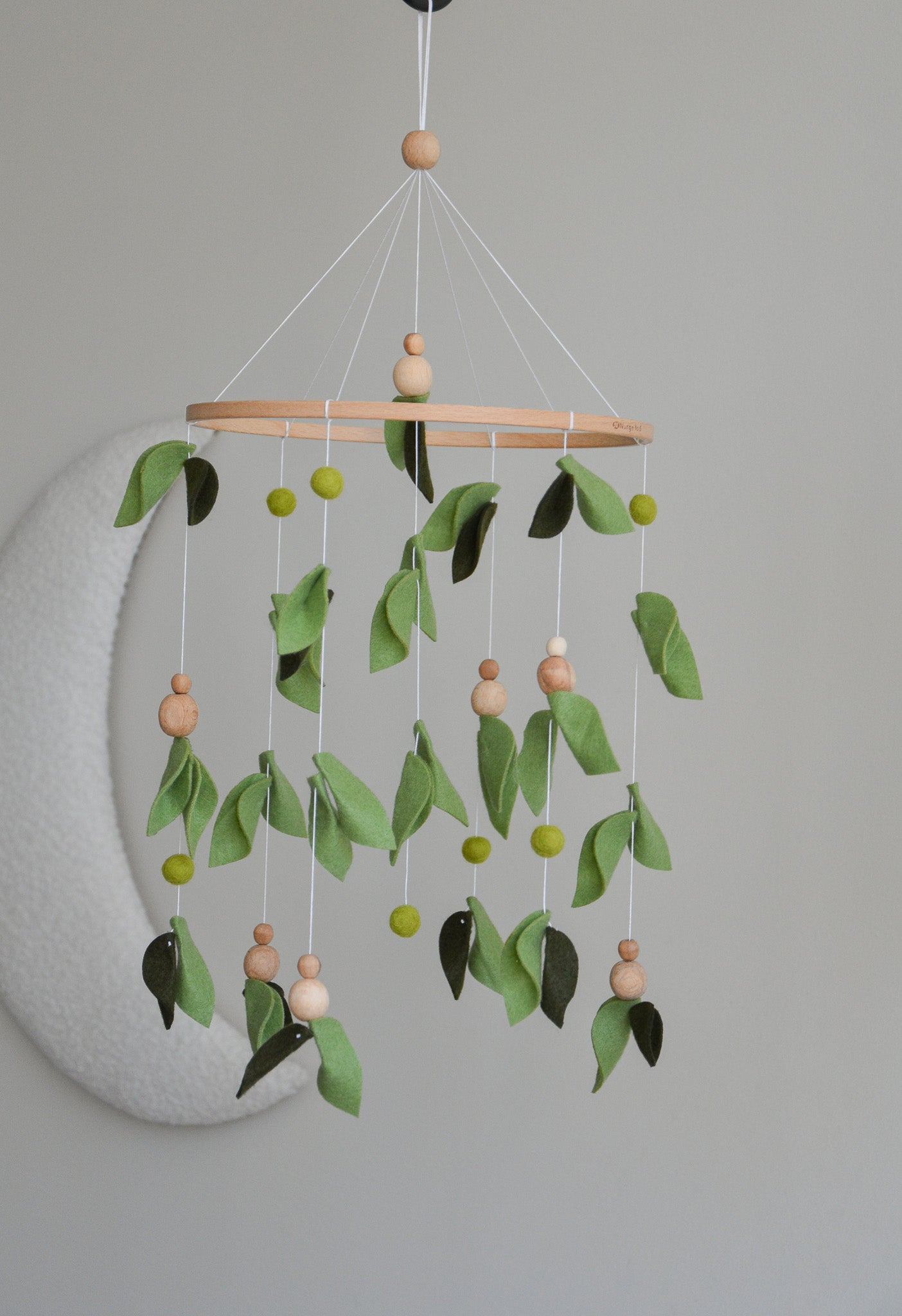 Forest style floral mobile with leaves and wooden pearls