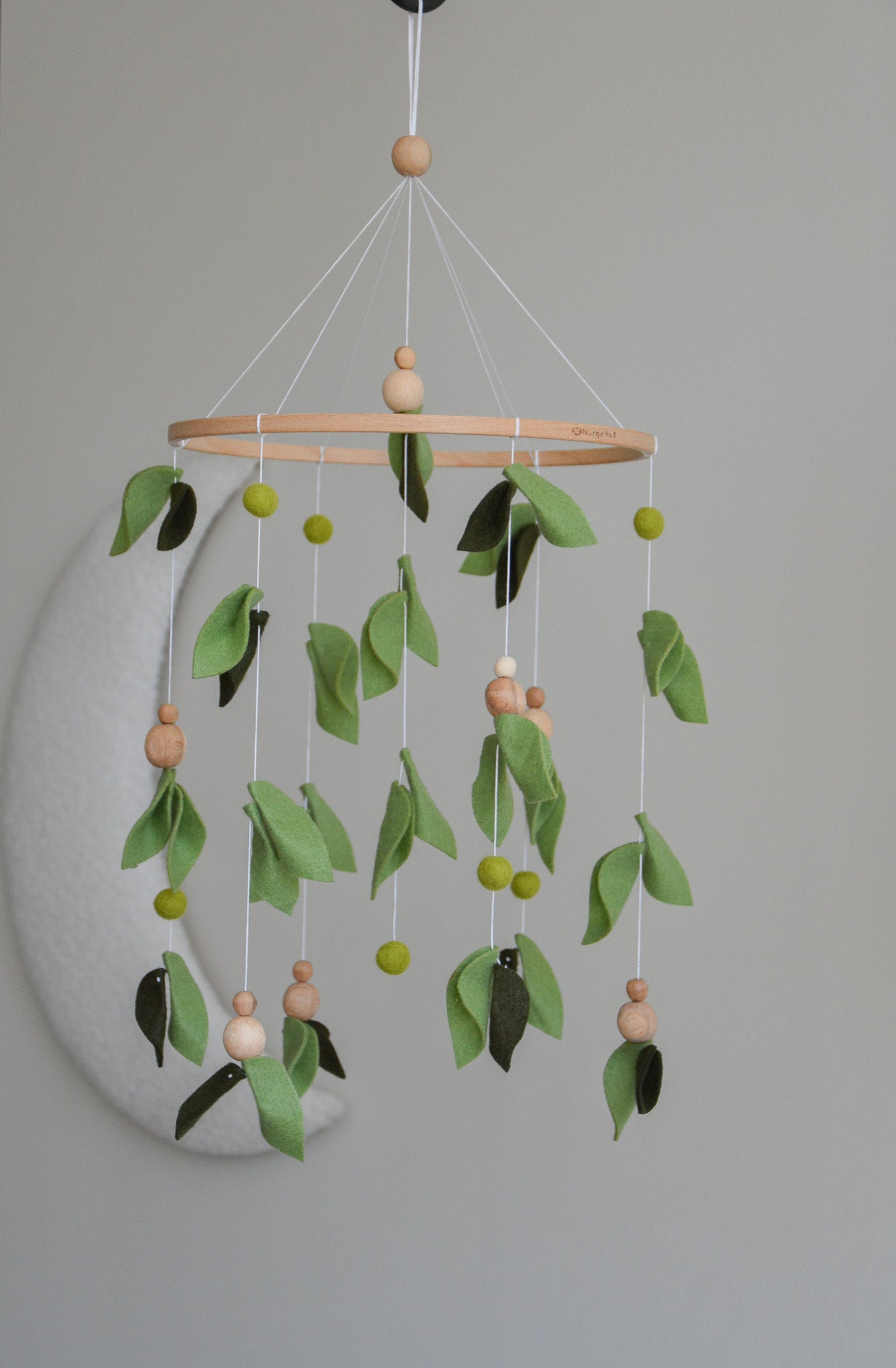 Forest style floral mobile with leaves and wooden pearls