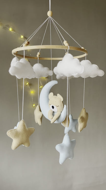 Baby mobile with sleeping/hanging bear, clouds and stars