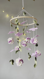 Floral mobile with purple white flower, butterfly and leaves