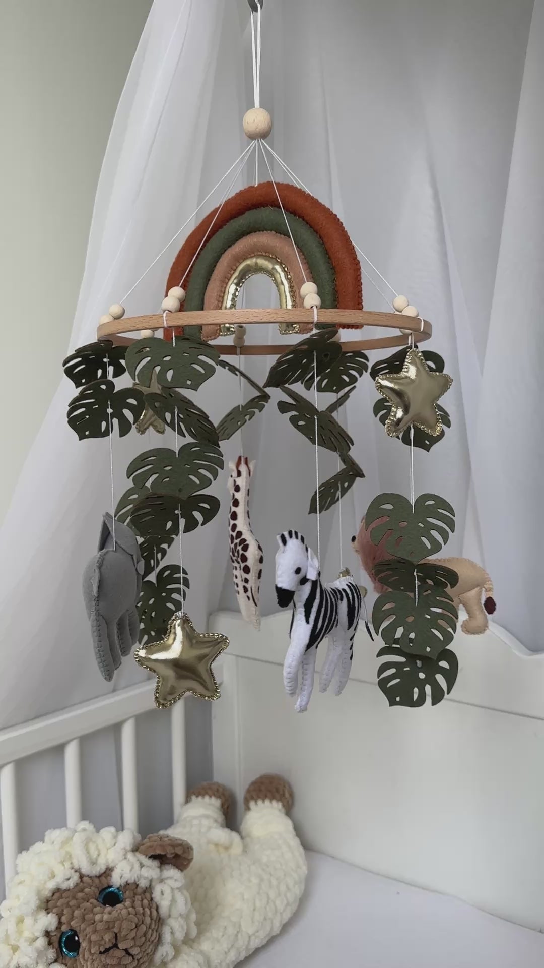 Safari Baby mobile with Lion, golden stars clouds, monstera leaves and rainbow