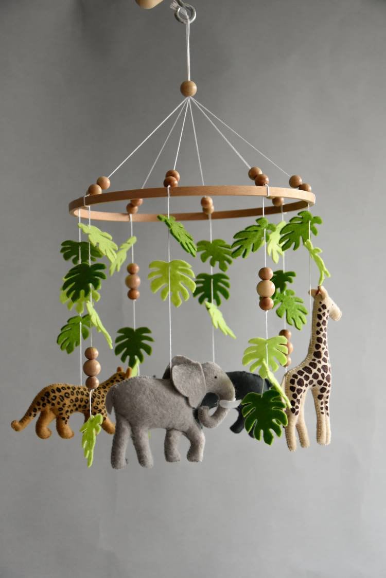 Safari mobile with giraffe, hippo, cheetah, elephant and wooden pearls