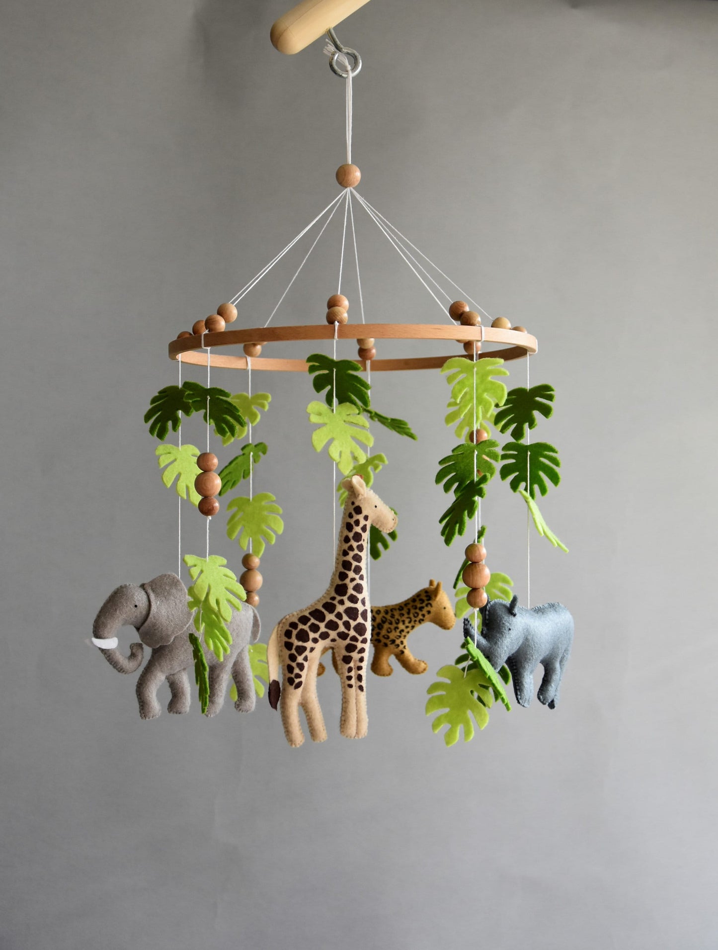 Safari mobile with giraffe, hippo, cheetah, elephant and wooden pearls