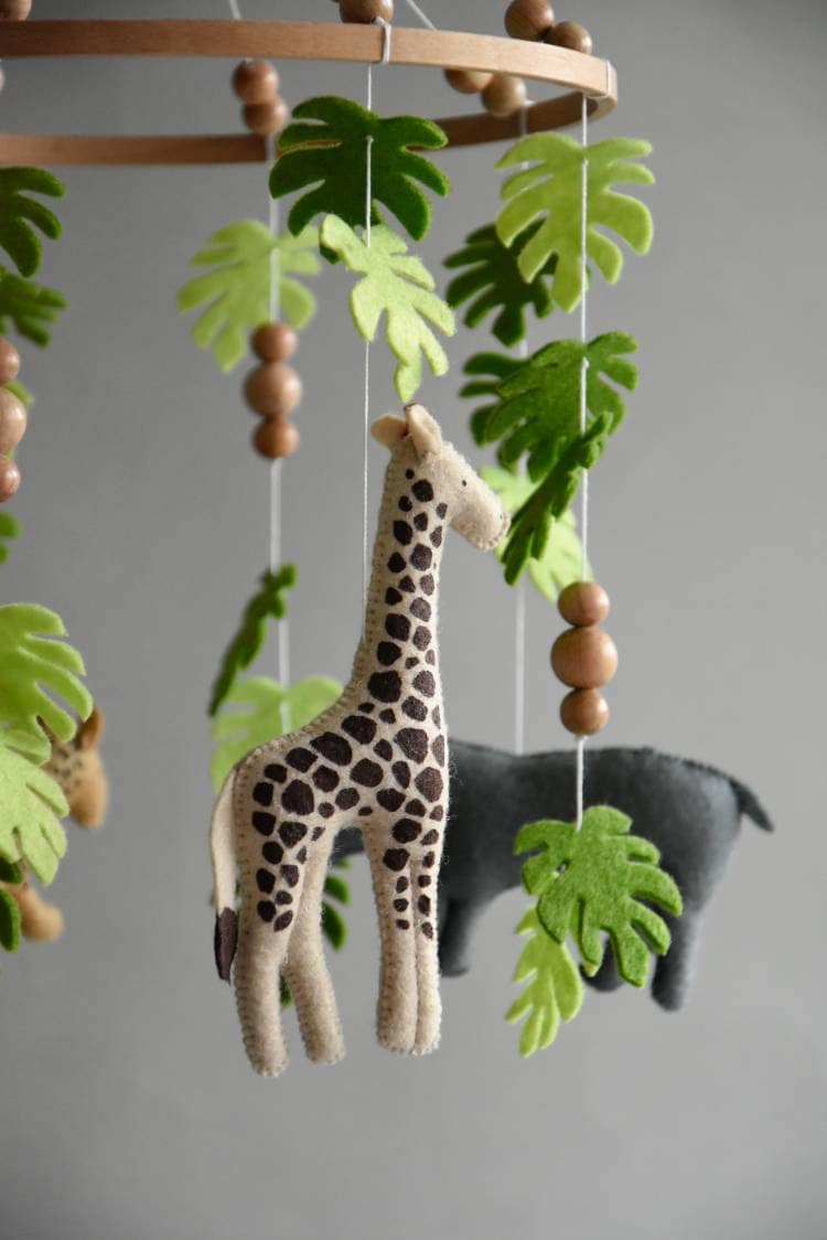 Safari mobile with giraffe, hippo, cheetah, elephant and wooden pearls