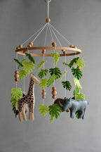Safari mobile with giraffe, hippo, cheetah, elephant and wooden pearls - Minidreams Decor