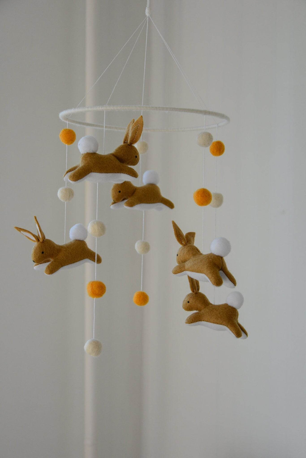Jumping bunny mobile with felted balls - Minidreams Decor
