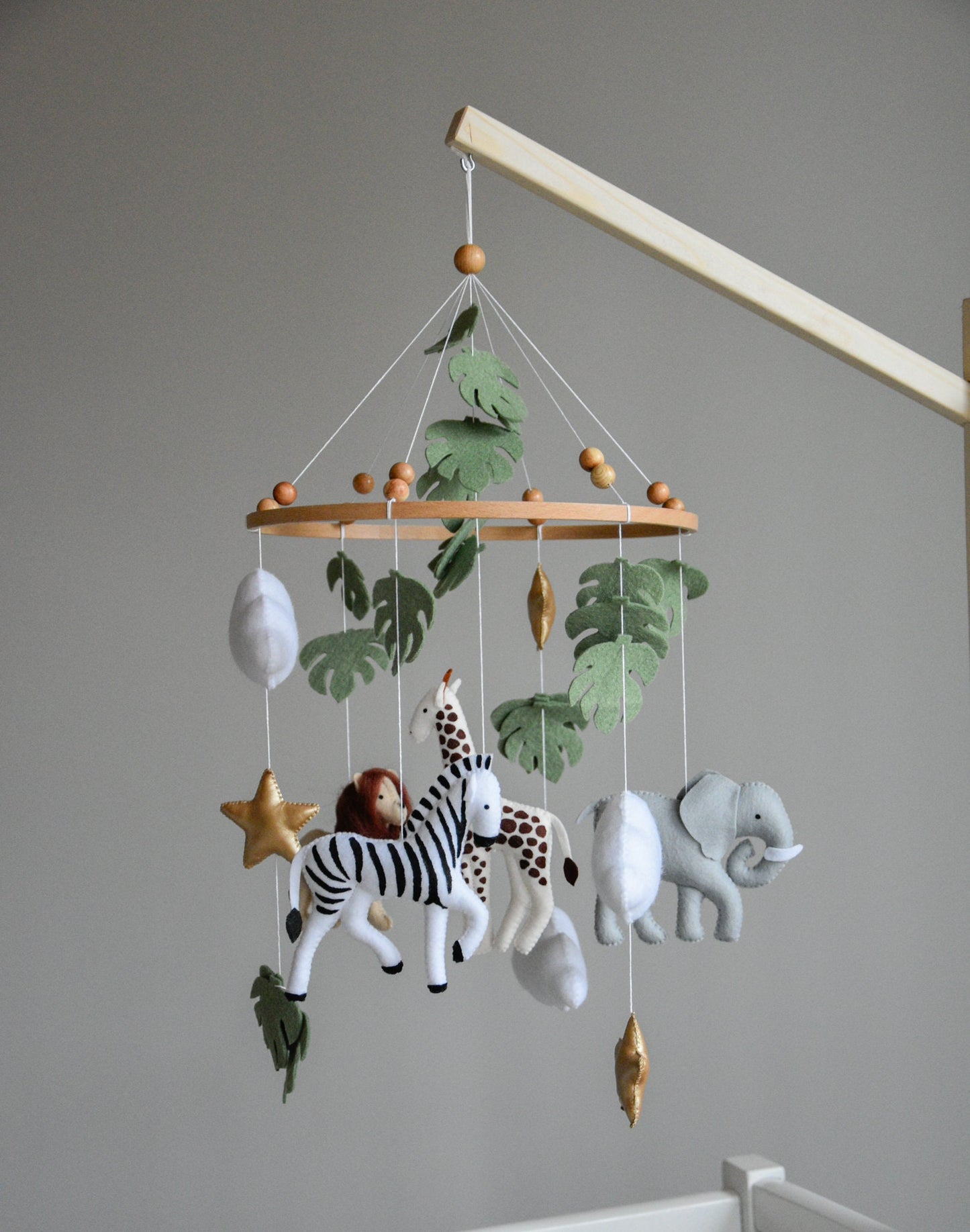 Safari mobile with felt, giraffe, lion, zebra, elephant, star and clouds