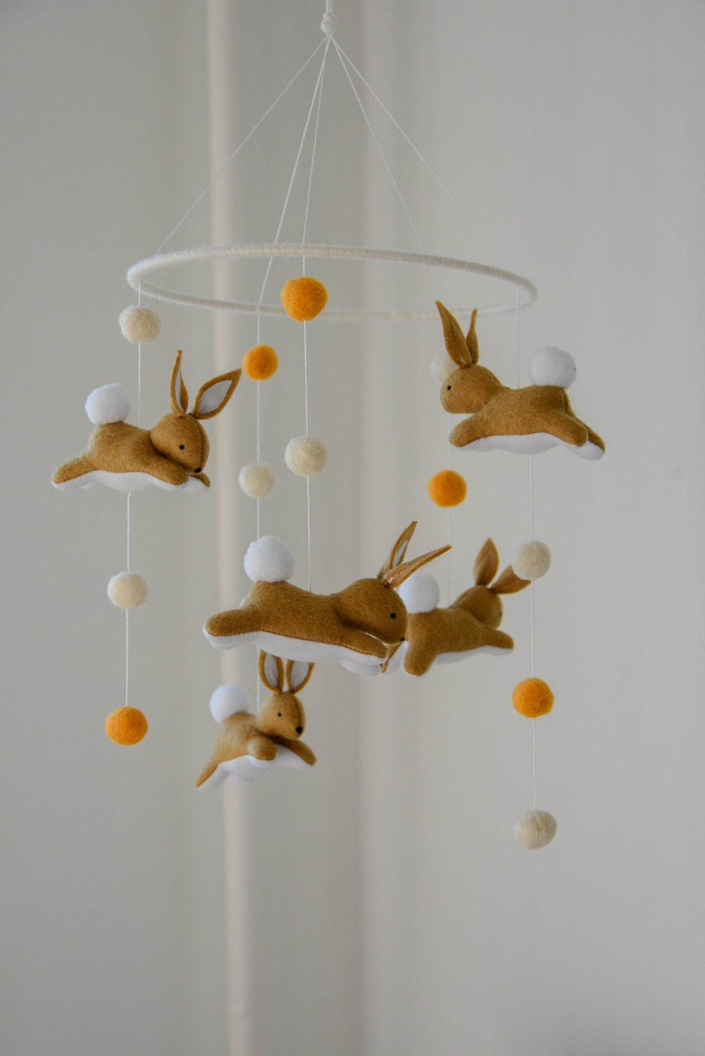 Jumping bunny mobile with felted balls - Minidreams Decor