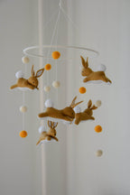 Jumping bunny mobile with felted balls - Minidreams Decor