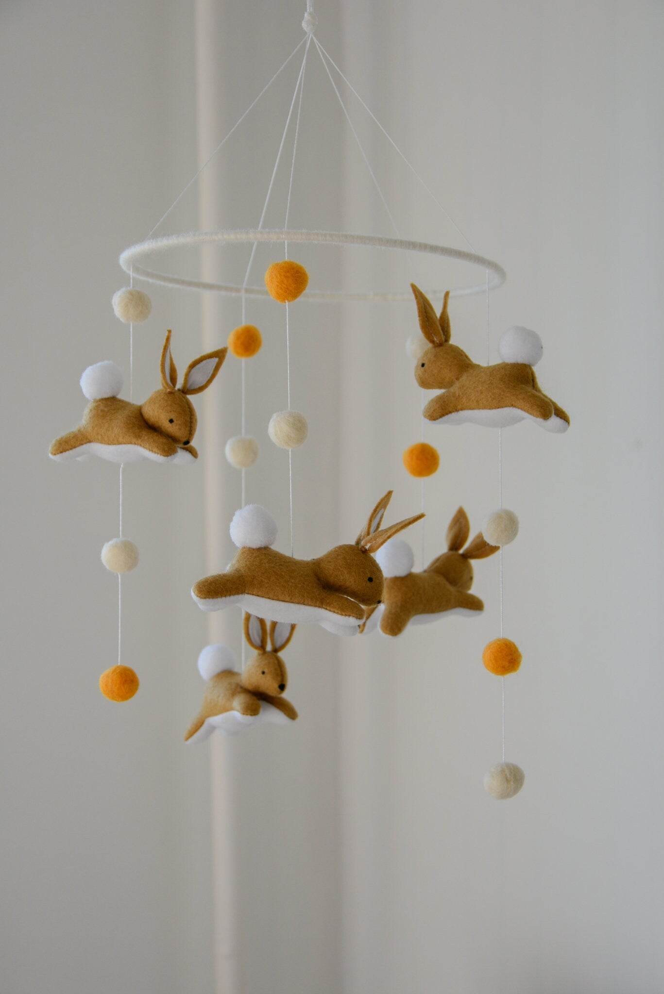 Jumping bunny mobile with felted balls - Minidreams Decor