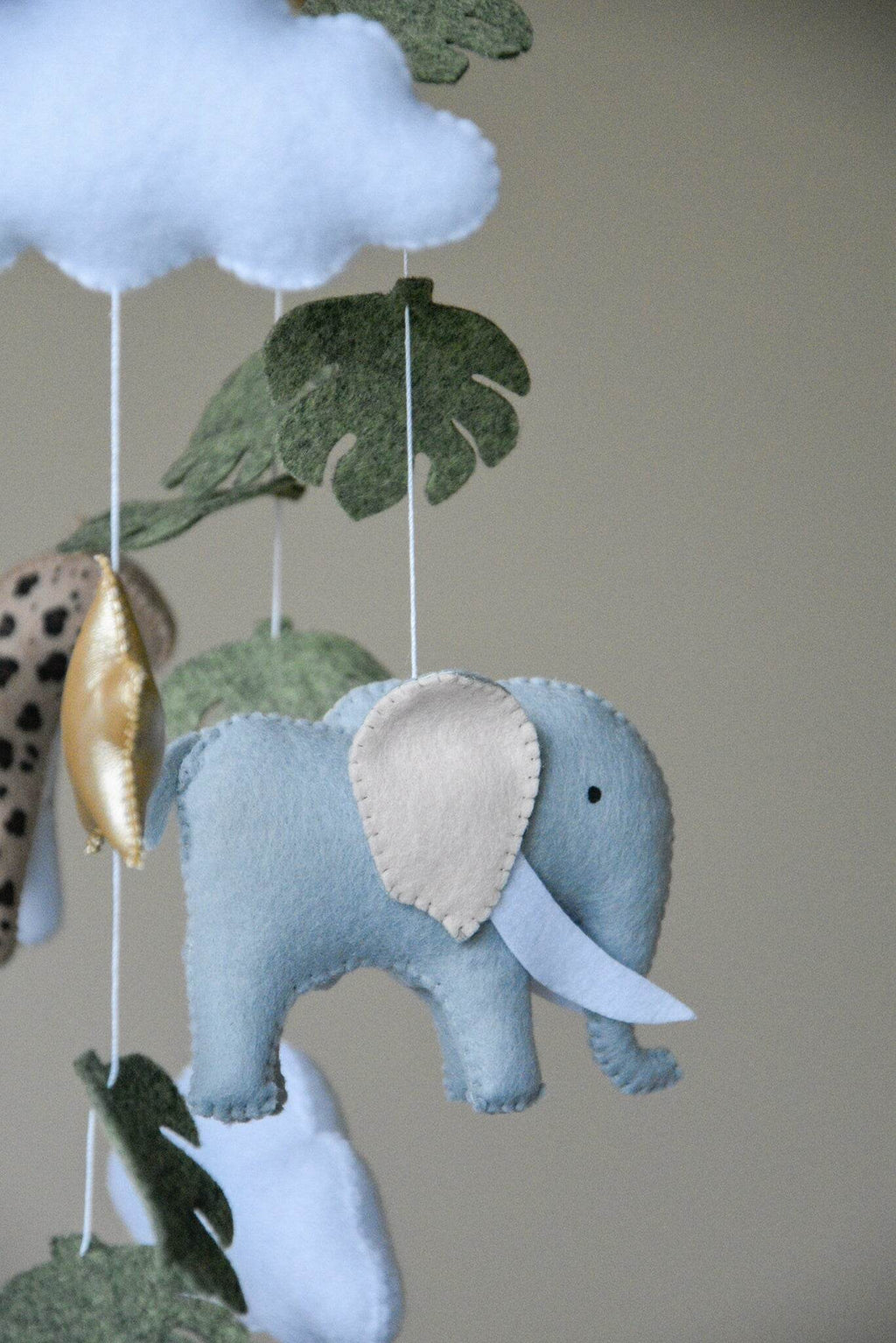 Safari mobile with cute African animals,giraffe, elephant, lion, zebra and monstera leaves - Minidreams Decor