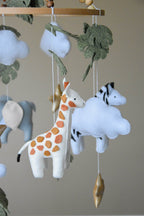 Safari mobile with cute African animals,giraffe, elephant, lion, zebra and monstera leaves - Minidreams Decor
