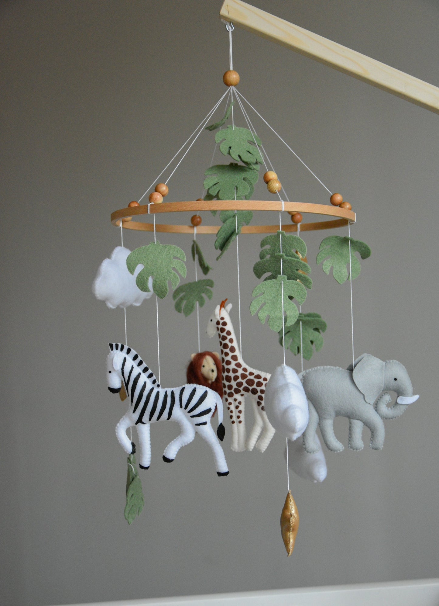 Safari mobile with felt, giraffe, lion, zebra, elephant, star and clouds