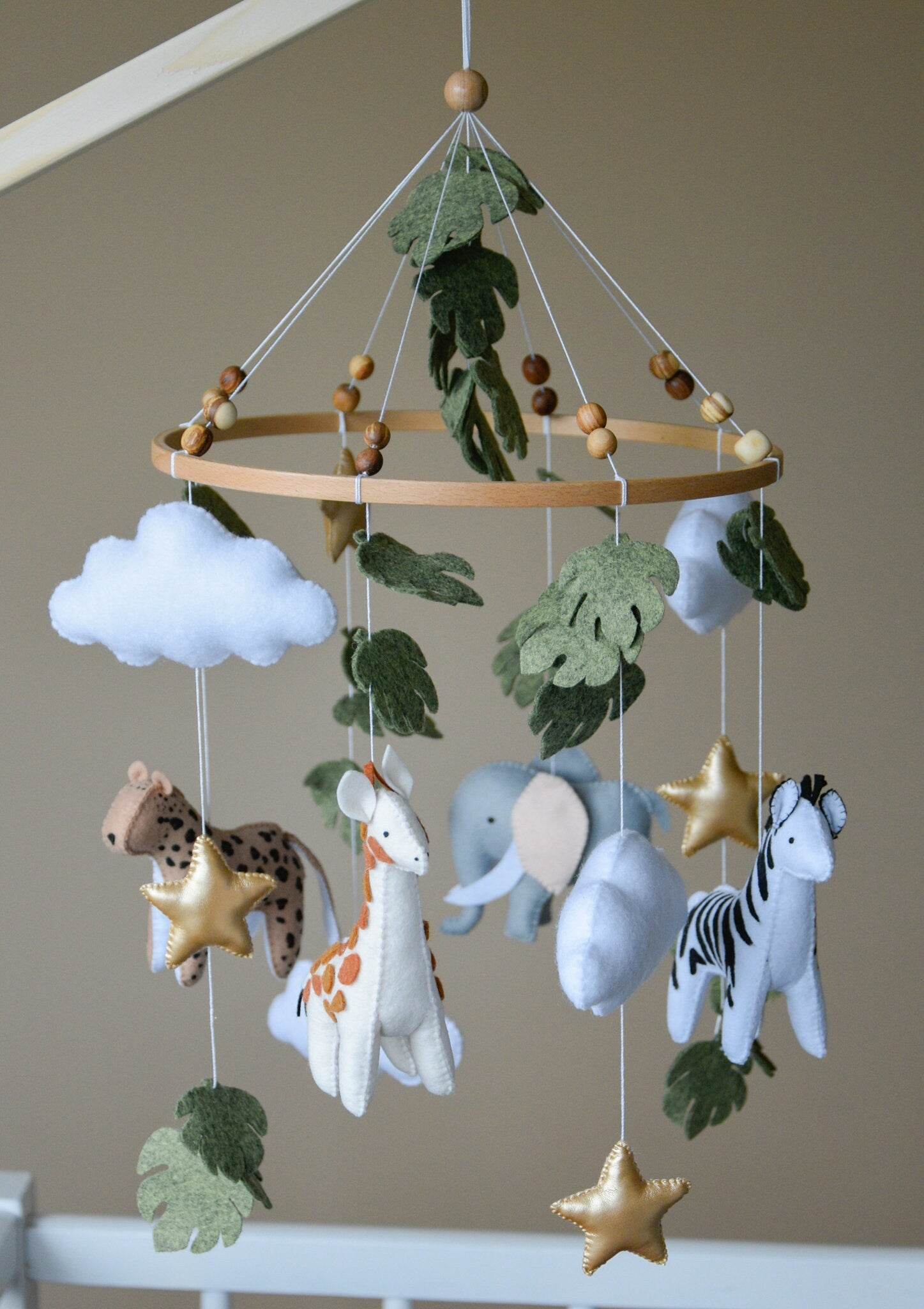 Safari mobile with cute African animals,giraffe, elephant, lion, zebra and monstera leaves - Minidreams Decor