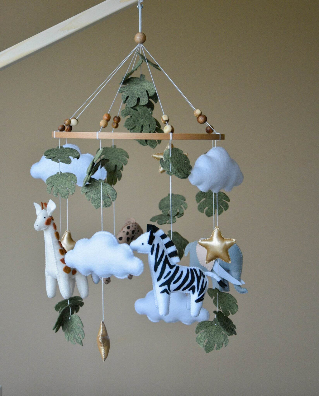 Safari mobile with cute African animals,giraffe, elephant, lion, zebra and monstera leaves - Minidreams Decor